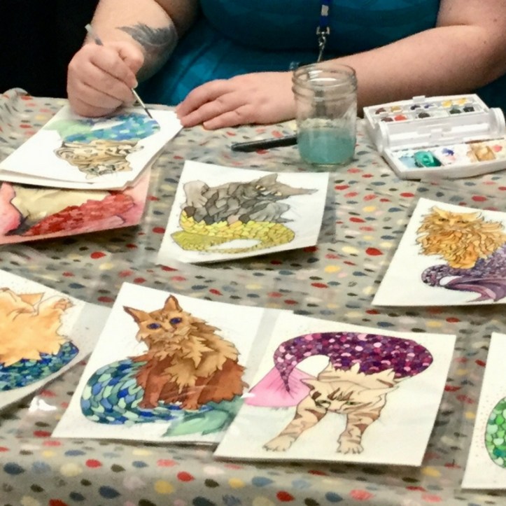 Sara Ferguson, watercolor paintings (Photo credit: @ocwexpo; 2018)